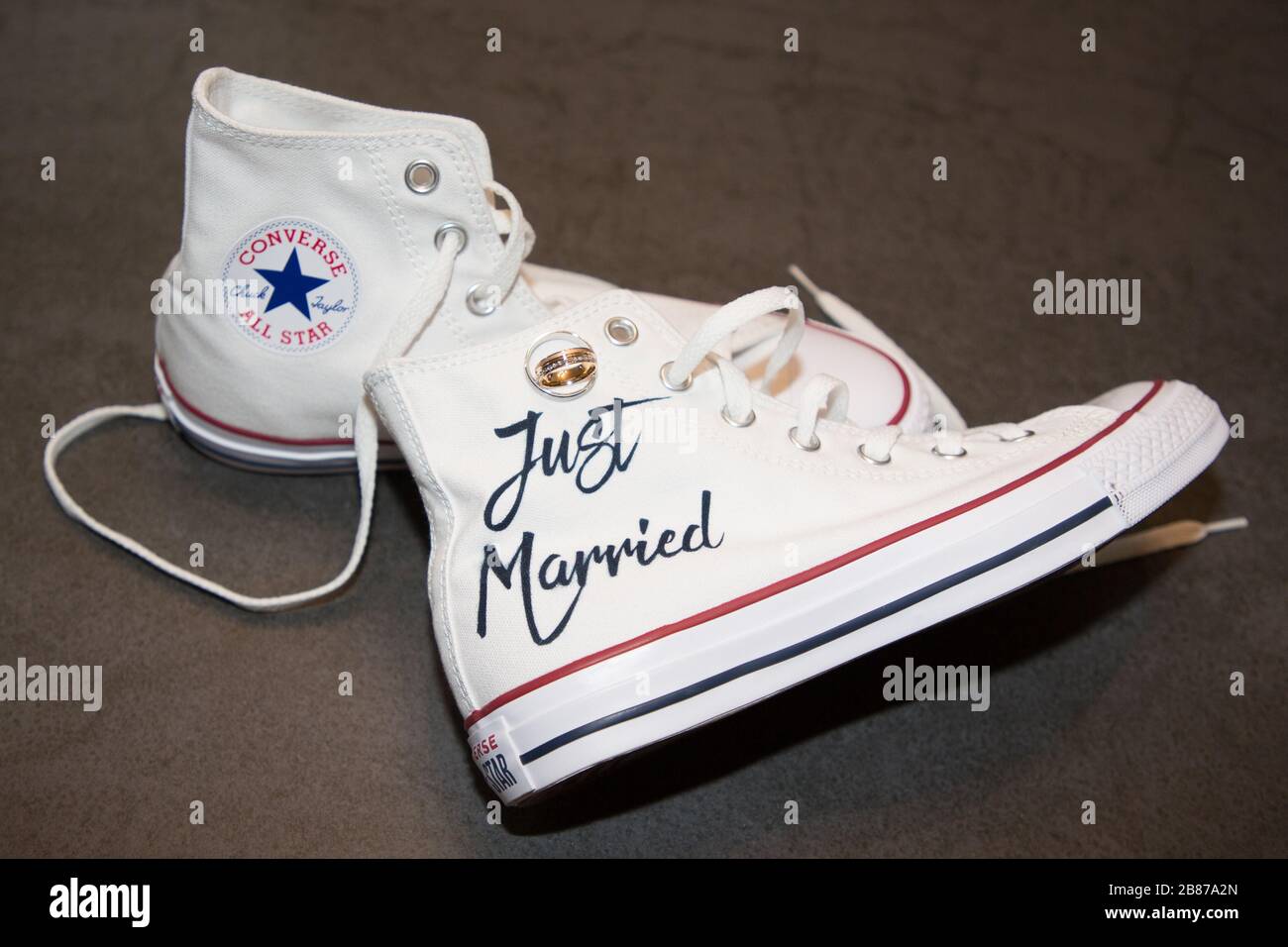 Bordeaux , Aquitaine / France - 11 07 2019 : Bride just married white  Sneakers converse all star chuck taylor with wedding rings Stock Photo -  Alamy