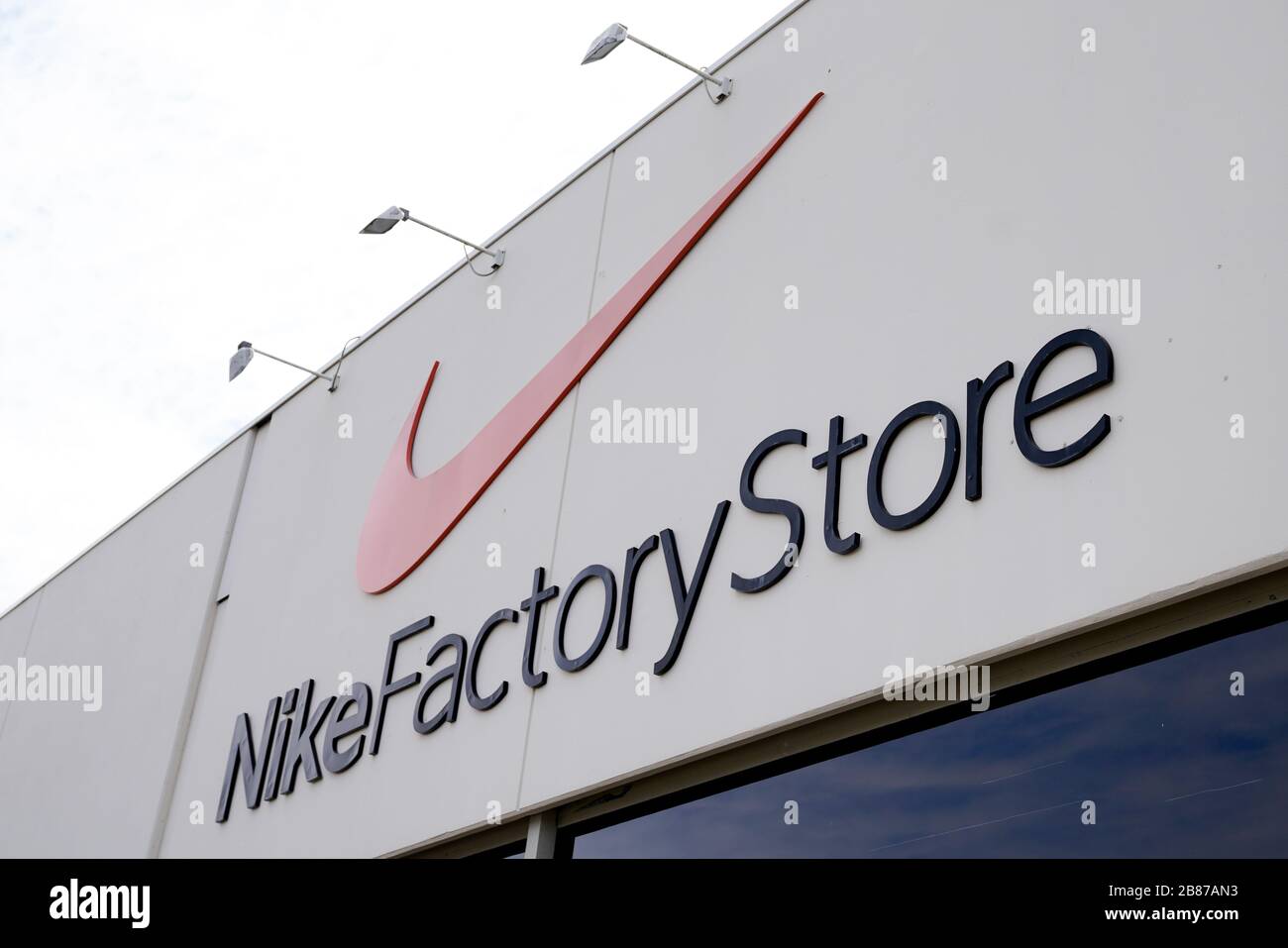 Bordeaux , Aquitaine / France - 09 24 2019 : Nike Factory Store shop front sign Stock Photo
