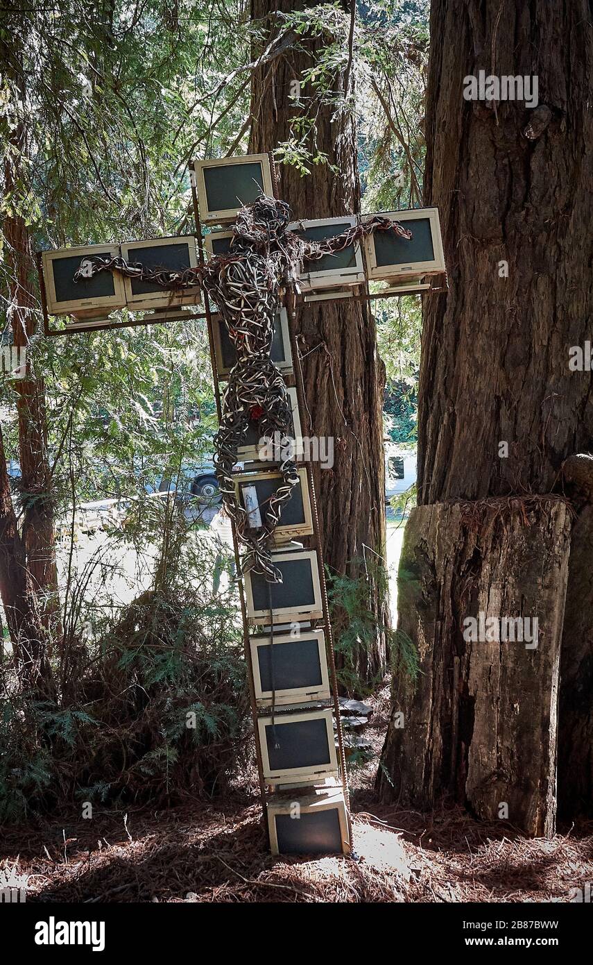 A crucifix made of computer screens in the garden of the Henry Miller Memorial Library in Big Sur. Stock Photo