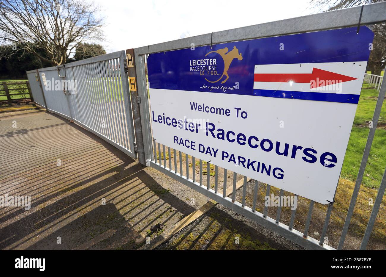 A general view of the locked gates at Leicester Racecourse as racing in Britain is on hold until the end of April at the earliest. Stock Photo