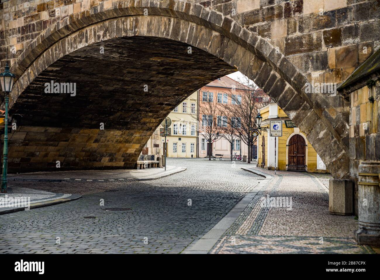 Prague, Czech republic - March 19, 2020. Street Na Kampe by Charles Bridge without tourists during coronavirus travel ban Stock Photo