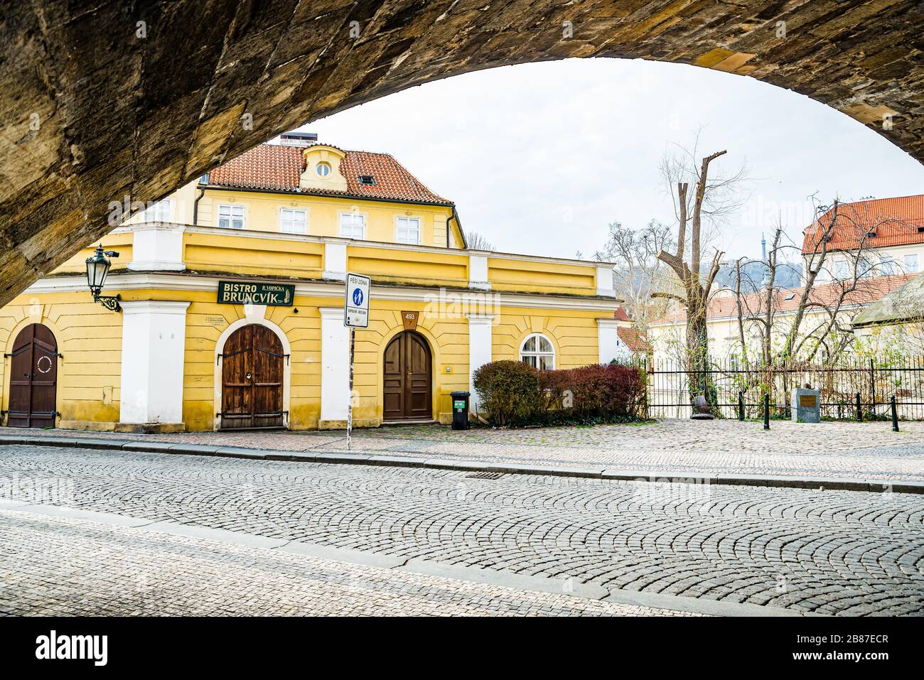 Prague, Czech republic - March 19, 2020. Street Na Kampe by Charles Bridge without tourists during coronavirus travel ban Stock Photo