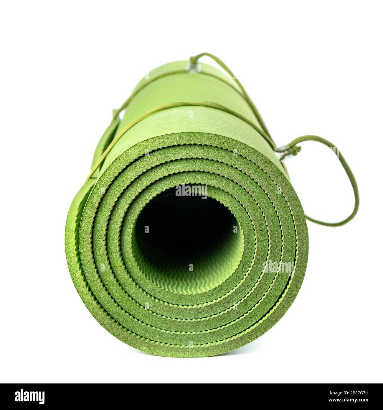 Green rolled sleeping mat isolated on white background Stock Photo Alamy
