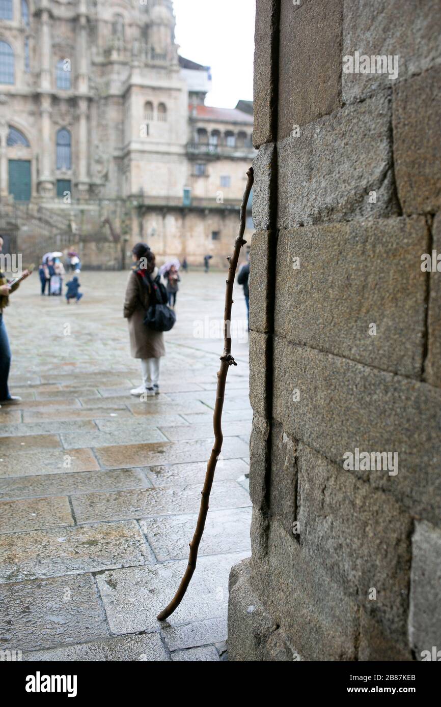 Walking stick used by a pilgrim at the plaza Obradoiro, infront of the Santiago de Compostela cathedral Stock Photo
