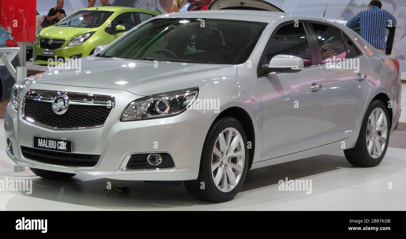 'English: 2012 Holden Malibu (EM) CDX sedan. This is a pre-production model, the production model made its Australian sales debut in June 2013. Photographed at the 2012 Australian International Motor Show, Sydney, New South Wales. Australia.; 26 October 2012; Own work; OSX; ' Stock Photo