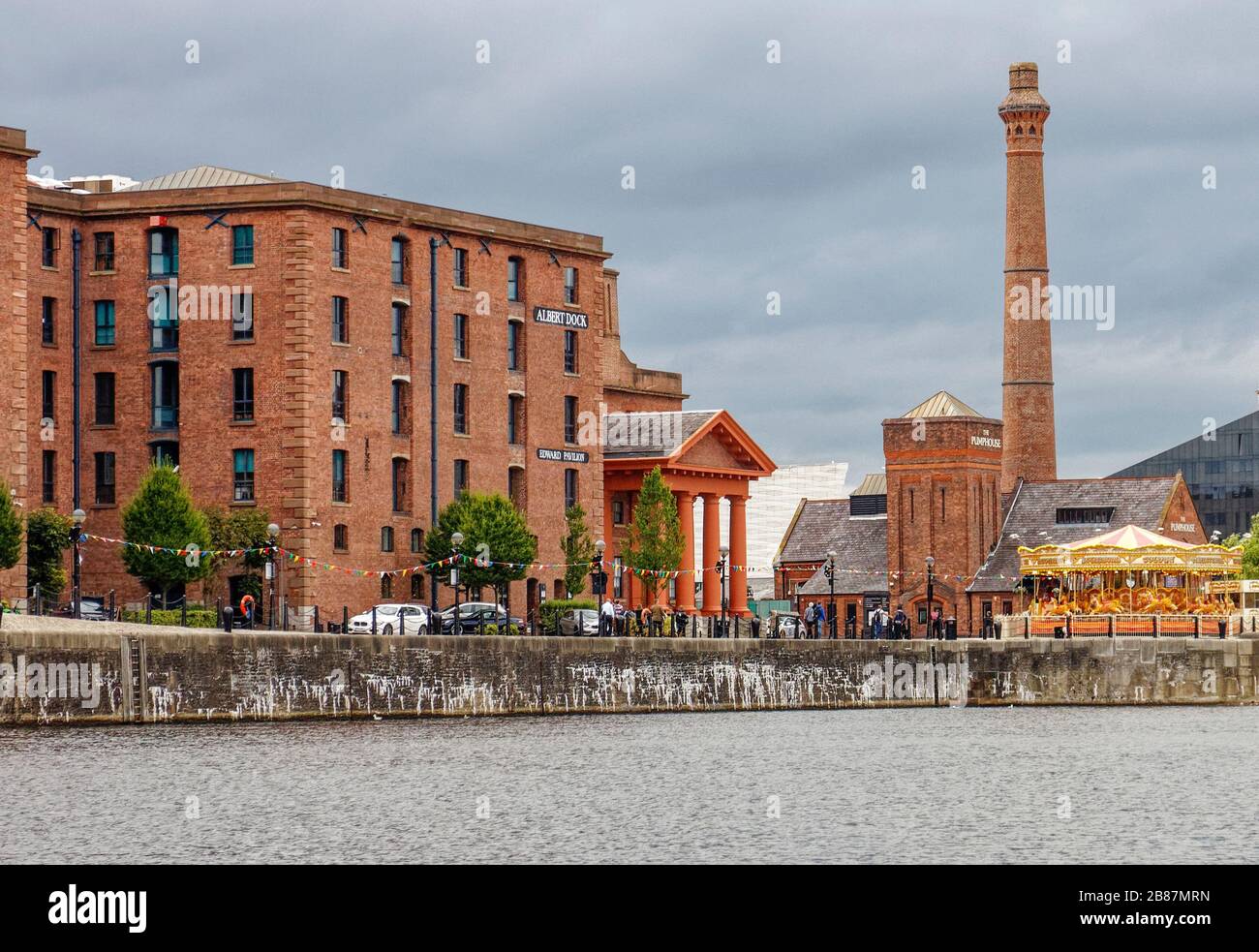 Former warehouses at Royal Albert Dock in Liverpool, seen.from Salthouse Dock. The Pumphouse once provided hydraulic power but is now a popular pub Stock Photo