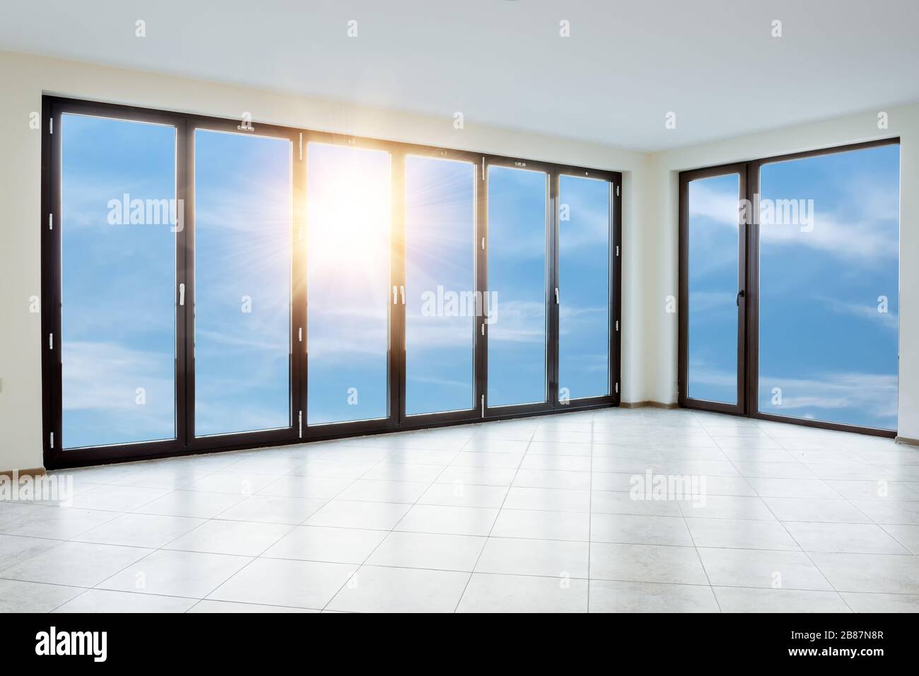 Empty white room with windows Stock Photo