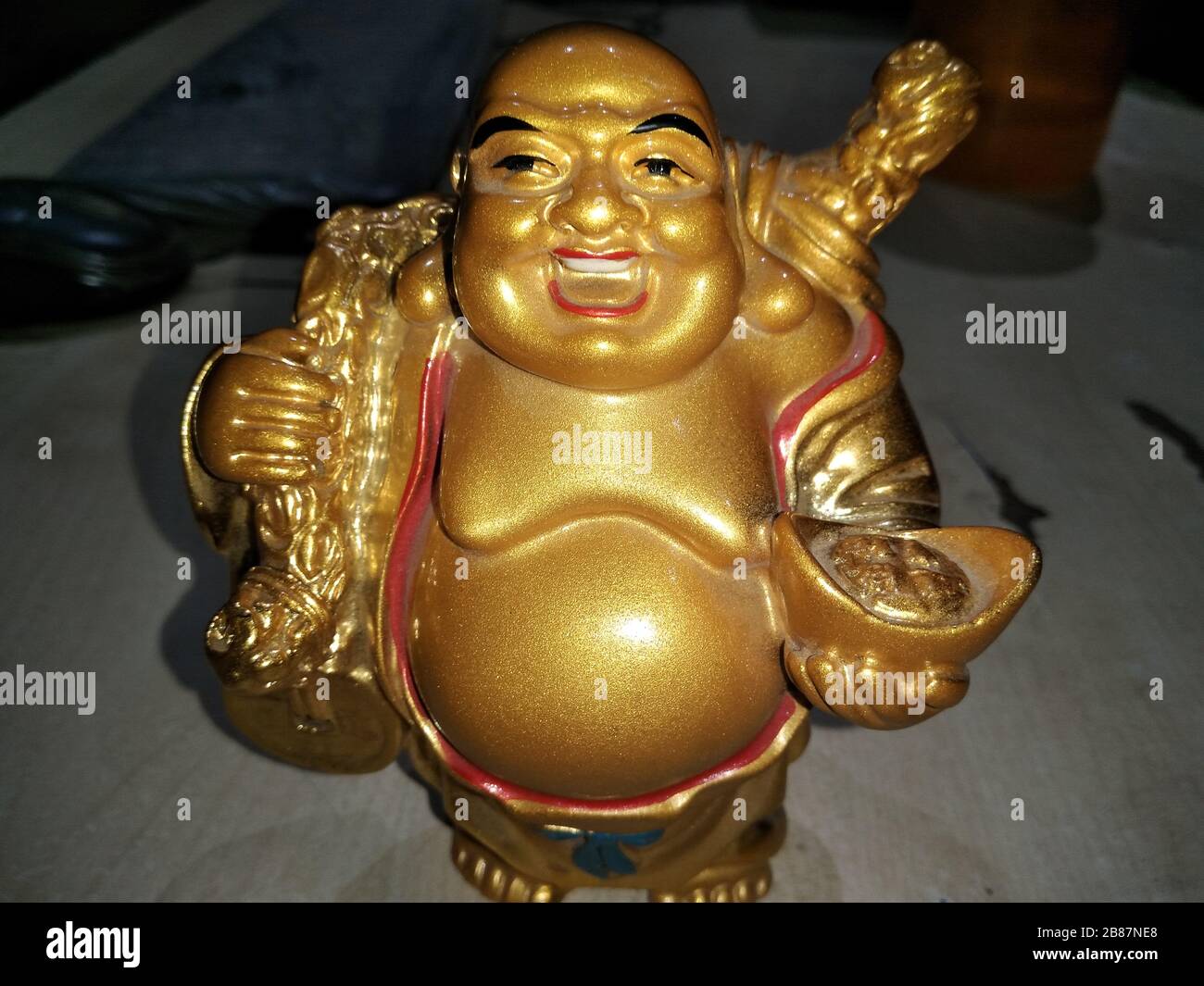 A picture of laughing budha statue Stock Photo