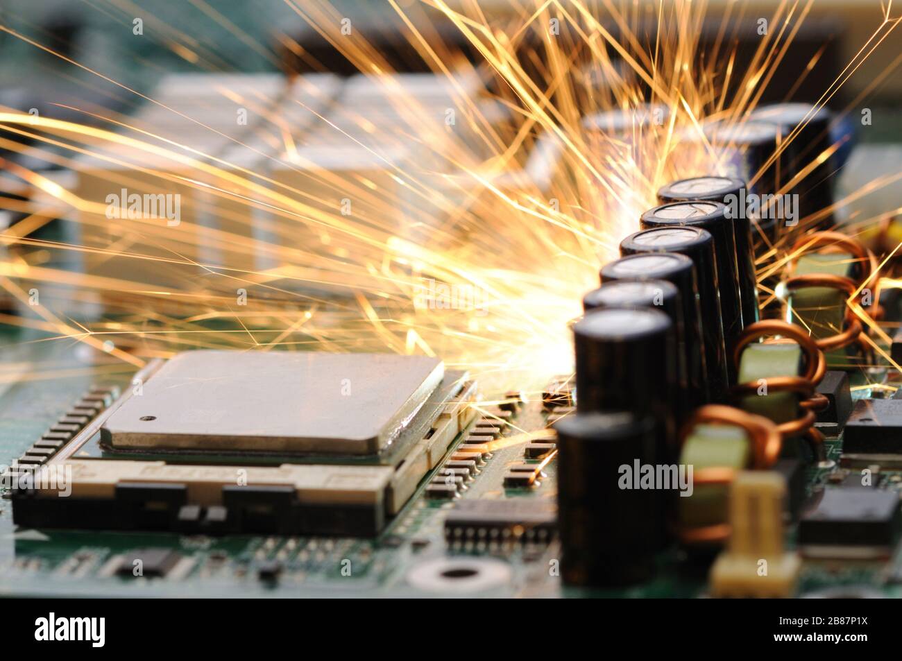 Burning sparks fly from the controller equipment control chip. The ...