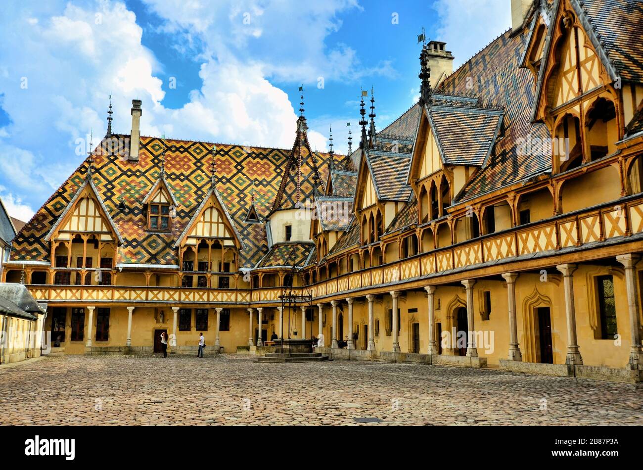 Iconic courtyard of Hotel Dieu, Beaune, France Stock Photo