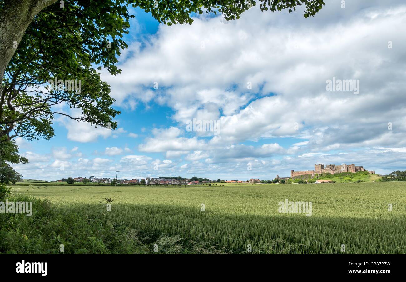 Bamburgh village and castle, Northumberland, England. The countryside ...