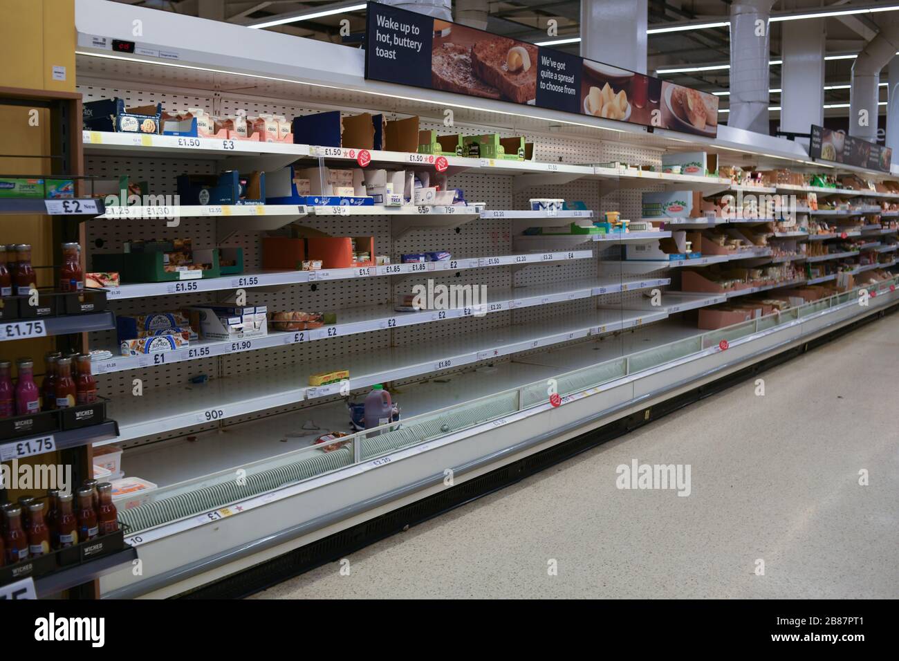 London, UK. 20th Mar 2020. Empty shelves at Tesco of the coronavirus