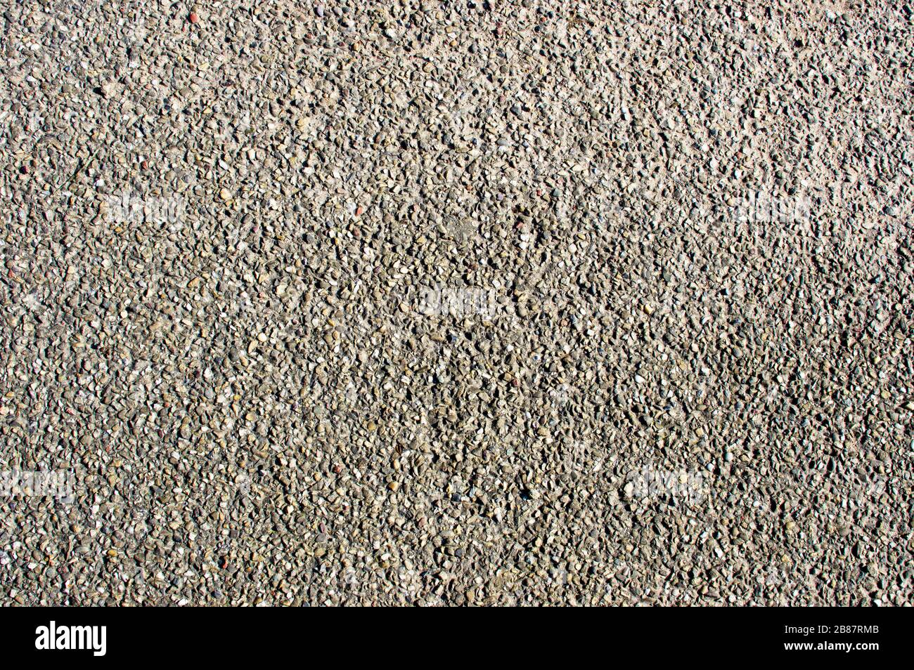Black asphalt with gravel texture background Stock Photo