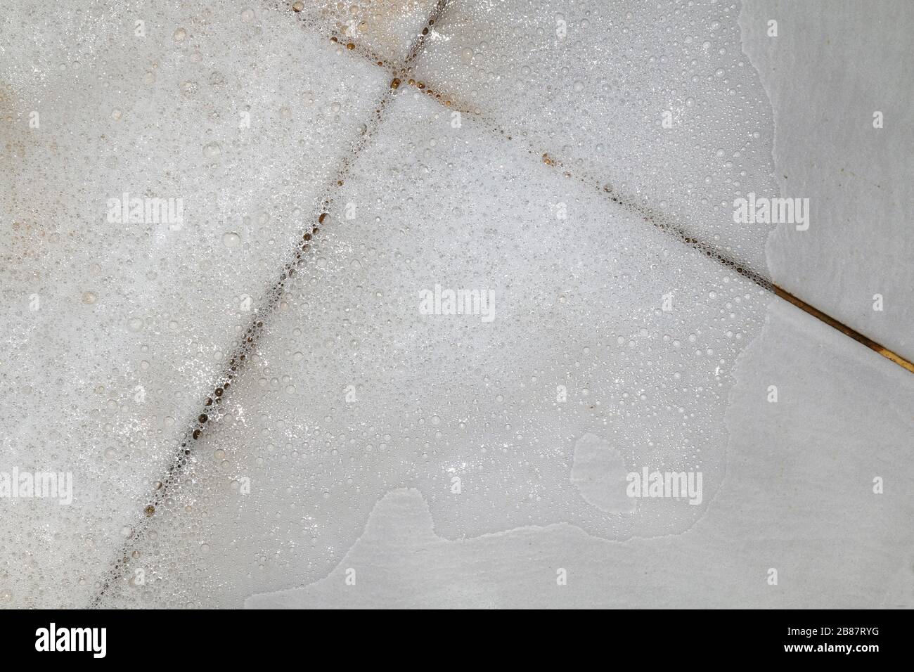 Bubbles soap detergent with scrubbing the bathroom floor dirt wet, Foam ...