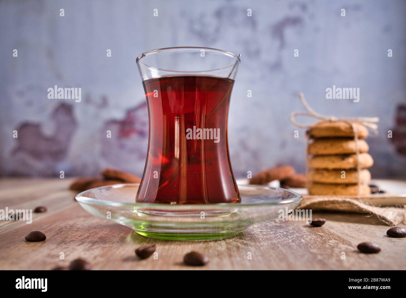 Beautifully stacked cookies with chocolate on Wooden table. Chocolate chip cookies Vintage Color. Traditional Turkish Tea. Stock Photo