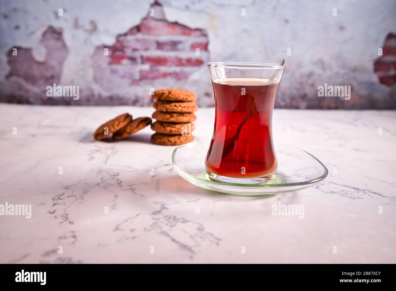 Beautifully stacked cookies with chocolate on Wooden table. Chocolate chip cookies Vintage Color. Traditional Turkish Tea. Stock Photo