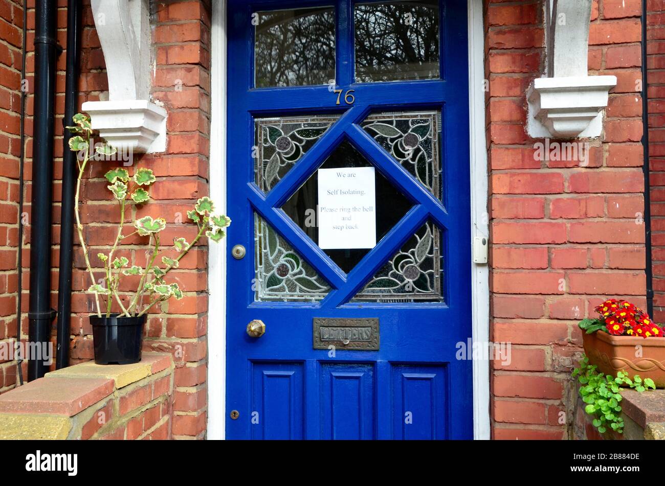 note on door tells visitors the occupants are self isolating in highgate london UK england Stock Photo