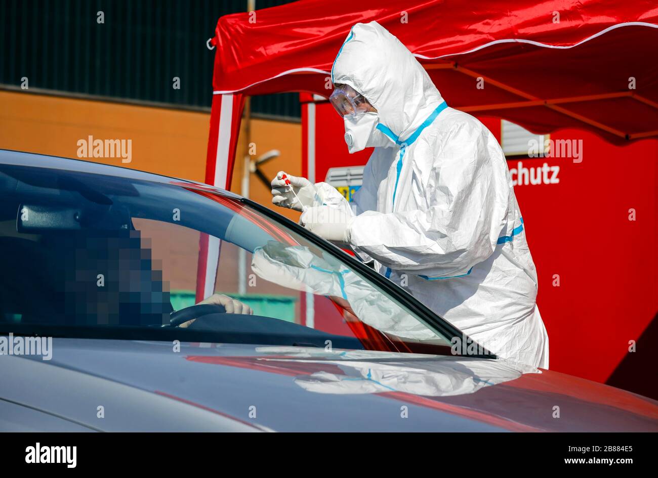 DriveIn, vehicle check for coronavirus test, doctor takes smear test