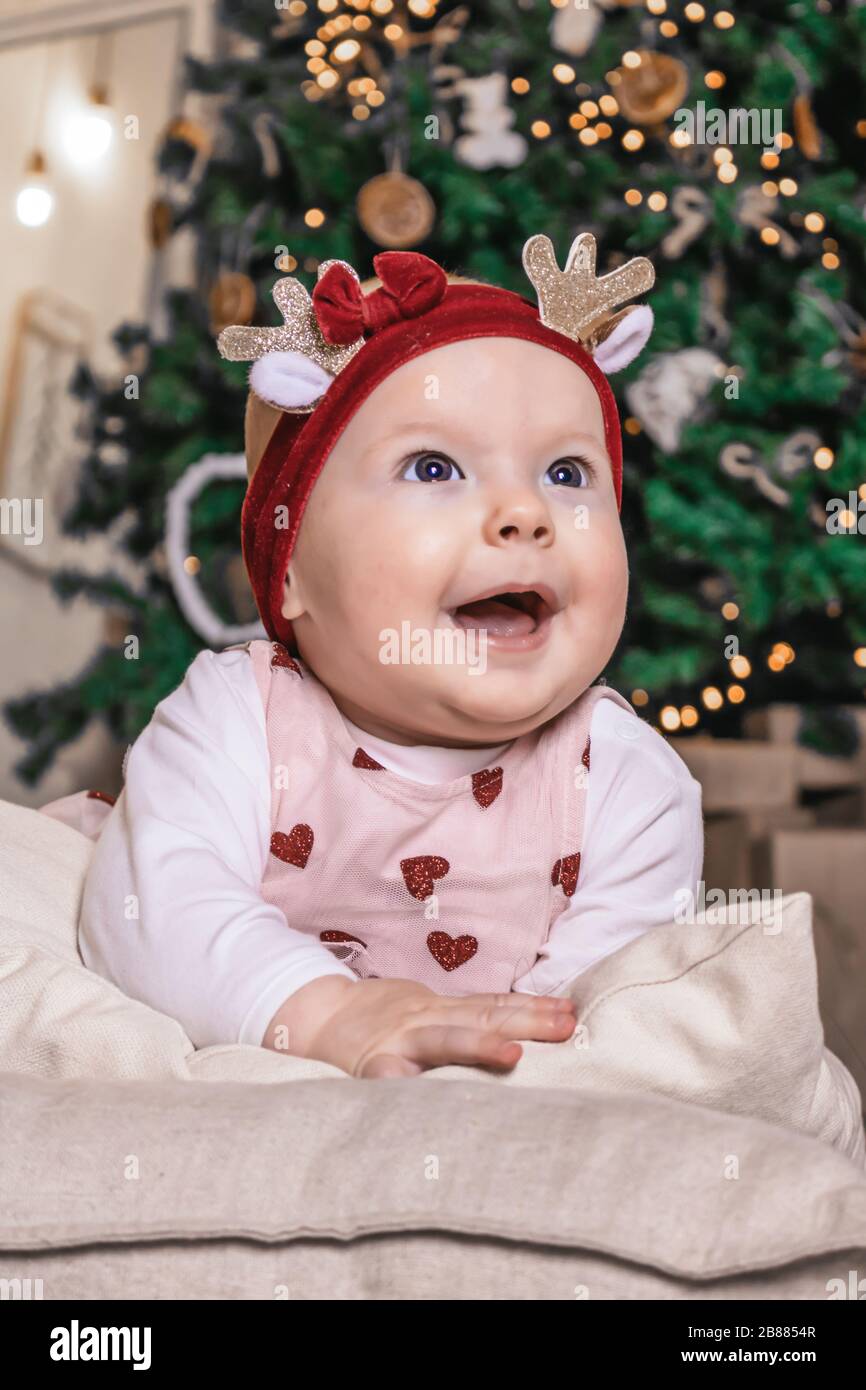 Christmas portrait of cute little baby girl photo Stock Photo - Alamy