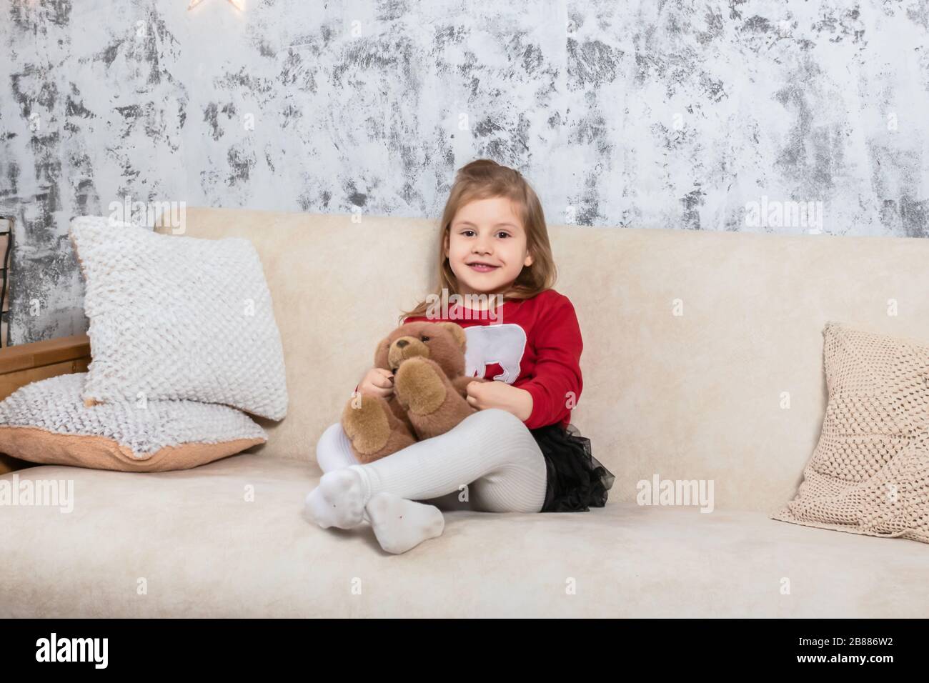 Christmas portrait of cute little girl photo Stock Photo - Alamy
