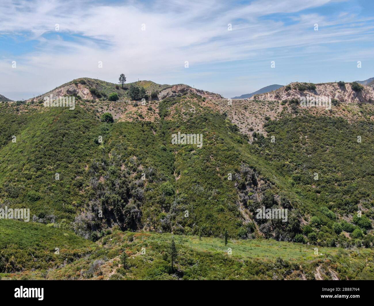 Aerial view of Angeles National Forests mountain, California, USA. Green mountain during hot