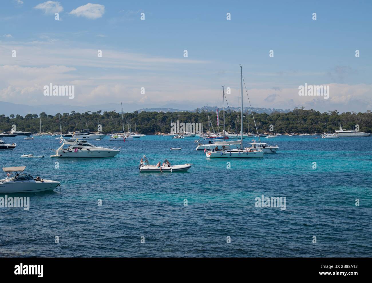 View from Lerins Island. Saint Honore. Yachts anchored in the blue bay. Travel locations in