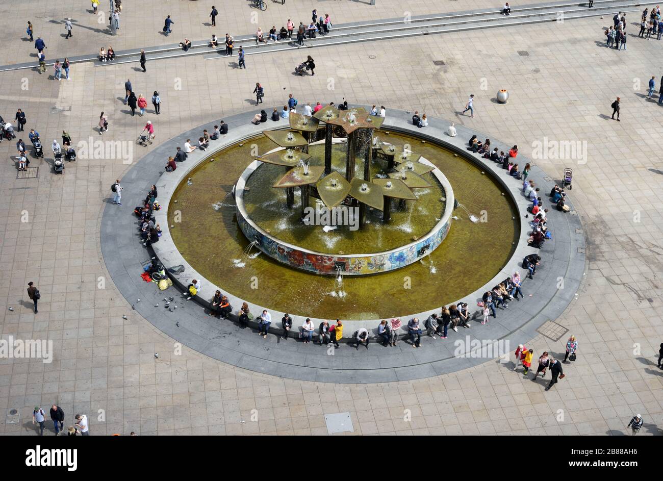 BERLIN, GERMANY 05-17-2019 A aerial view of the Alexanderplatz square, a busy public pedestrian square, with the Brunnen der Volkerfreundschaft founta Stock Photo