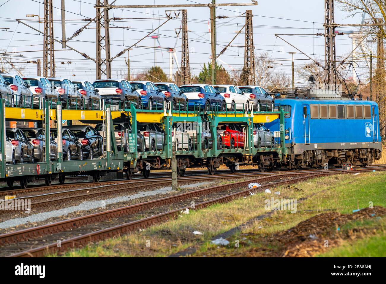 VW factory, Emden, new cars, car transporter, car train, freight train, with VW vehicles, Lower Saxony, Germany, Stock Photo