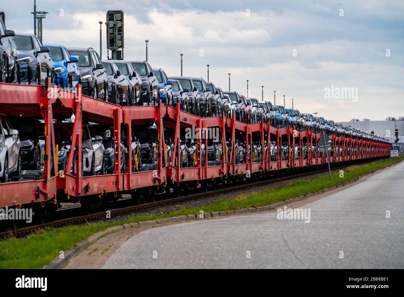 BMW new cars, on freight cars, in the port of Cuxhaven, are shipped from here to Great Britain and Scandinavia, Cuxhaven, Lower Saxony, Germany, Stock Photo