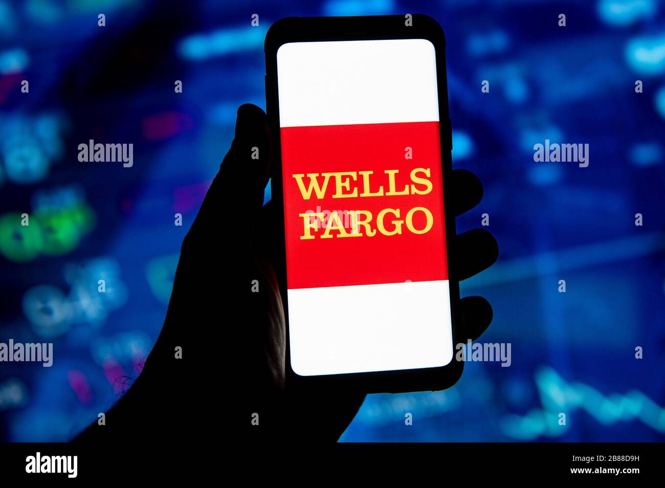 In this photo illustration a Wells Fargo bank logo seen displayed on a smartphone. Stock Photo