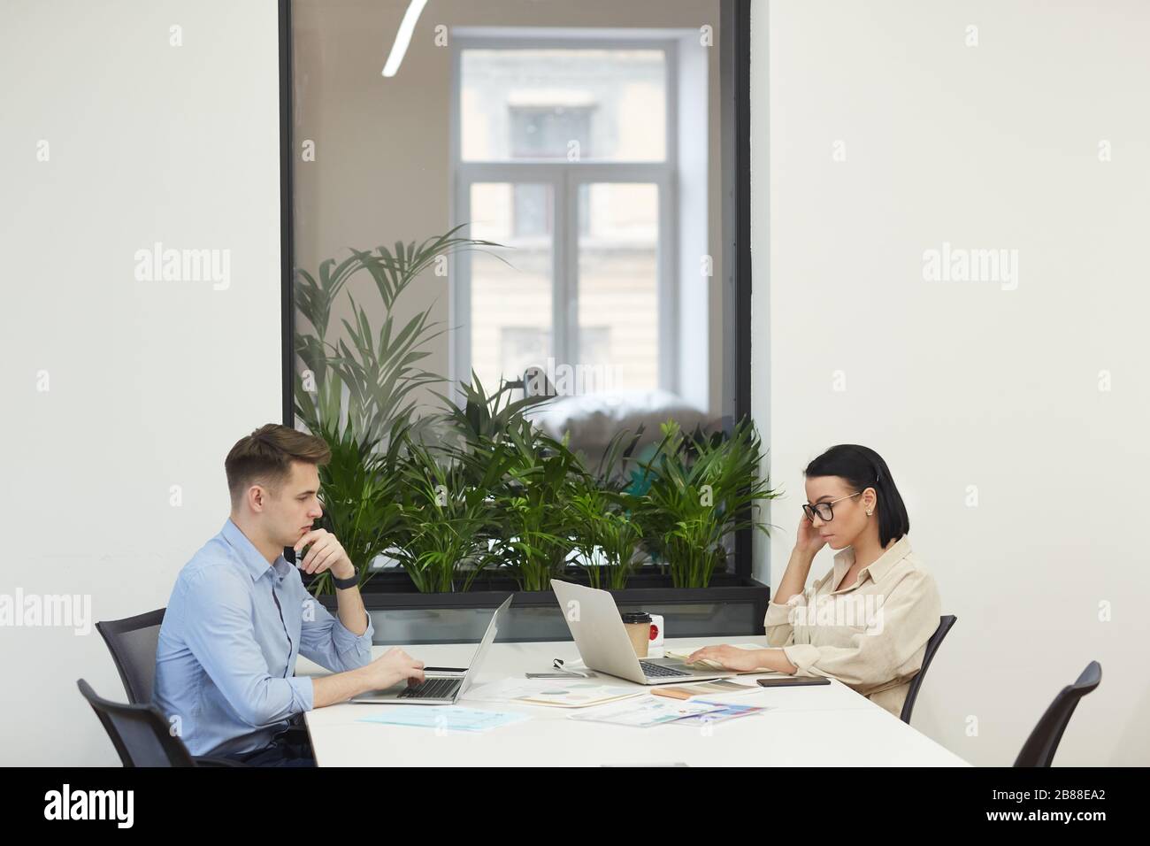 Planning people sitting computers work office hires stock photography and images Alamy