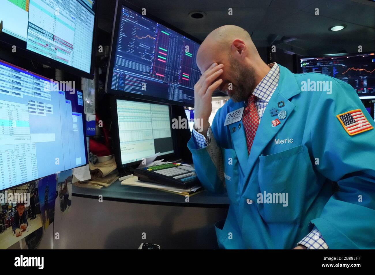 New York, New York, USA. 24th Feb, 2020. Traders work on the floor at the closing bell of the Dow Industrial Average at the New York Stock Exchange. Credit: Bryan Smith/ZUMA Wire/Alamy Live News Stock Photo