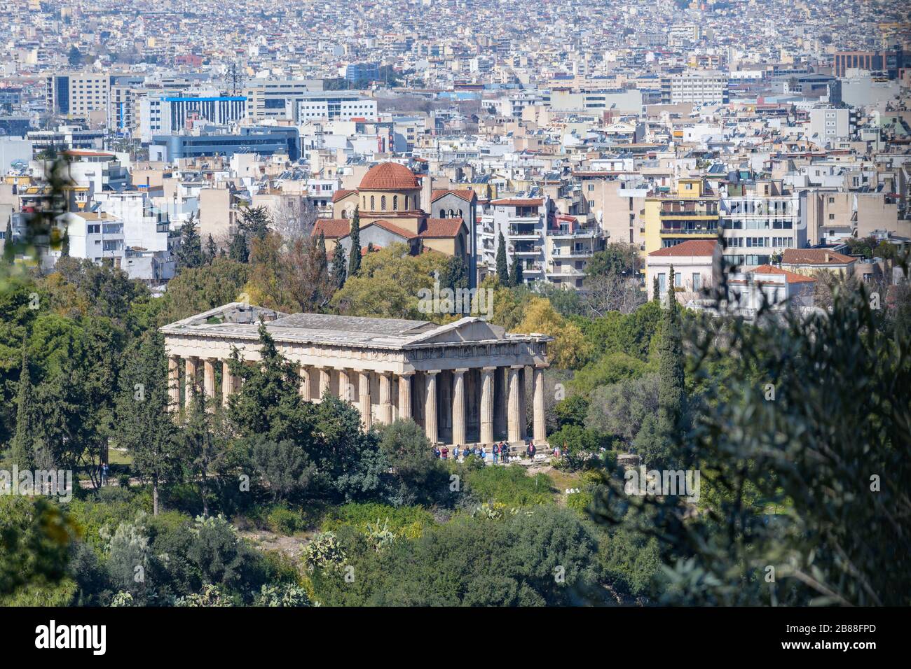 Temple of Hephaestus seen from distance in ancient Agora, Athens Stock Photo