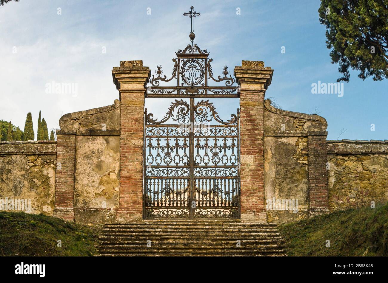 Characteristic gate of a public cemetery Stock Photo
