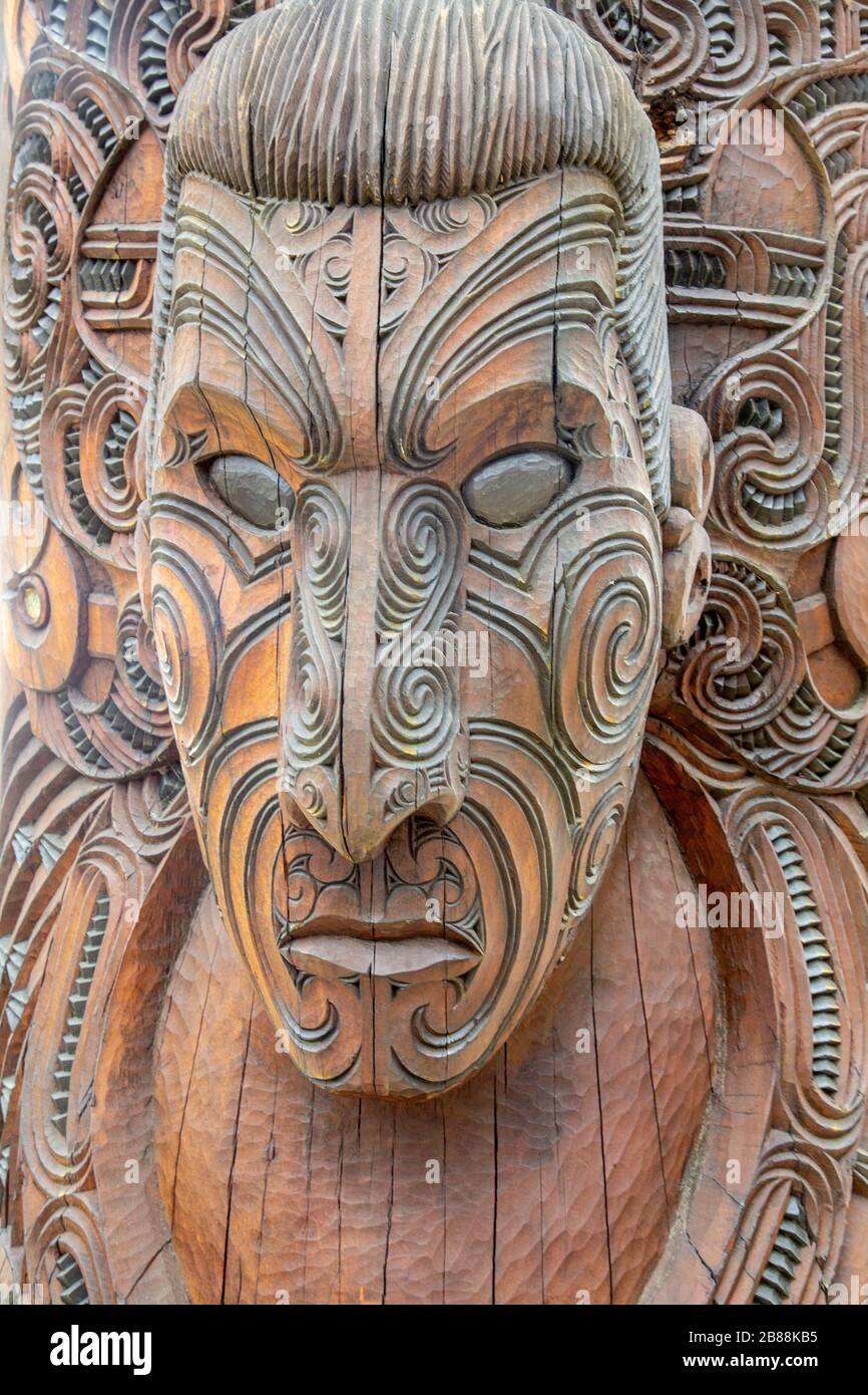 Carved Maori mask in Rotorura New Zealand Stock Photo Alamy