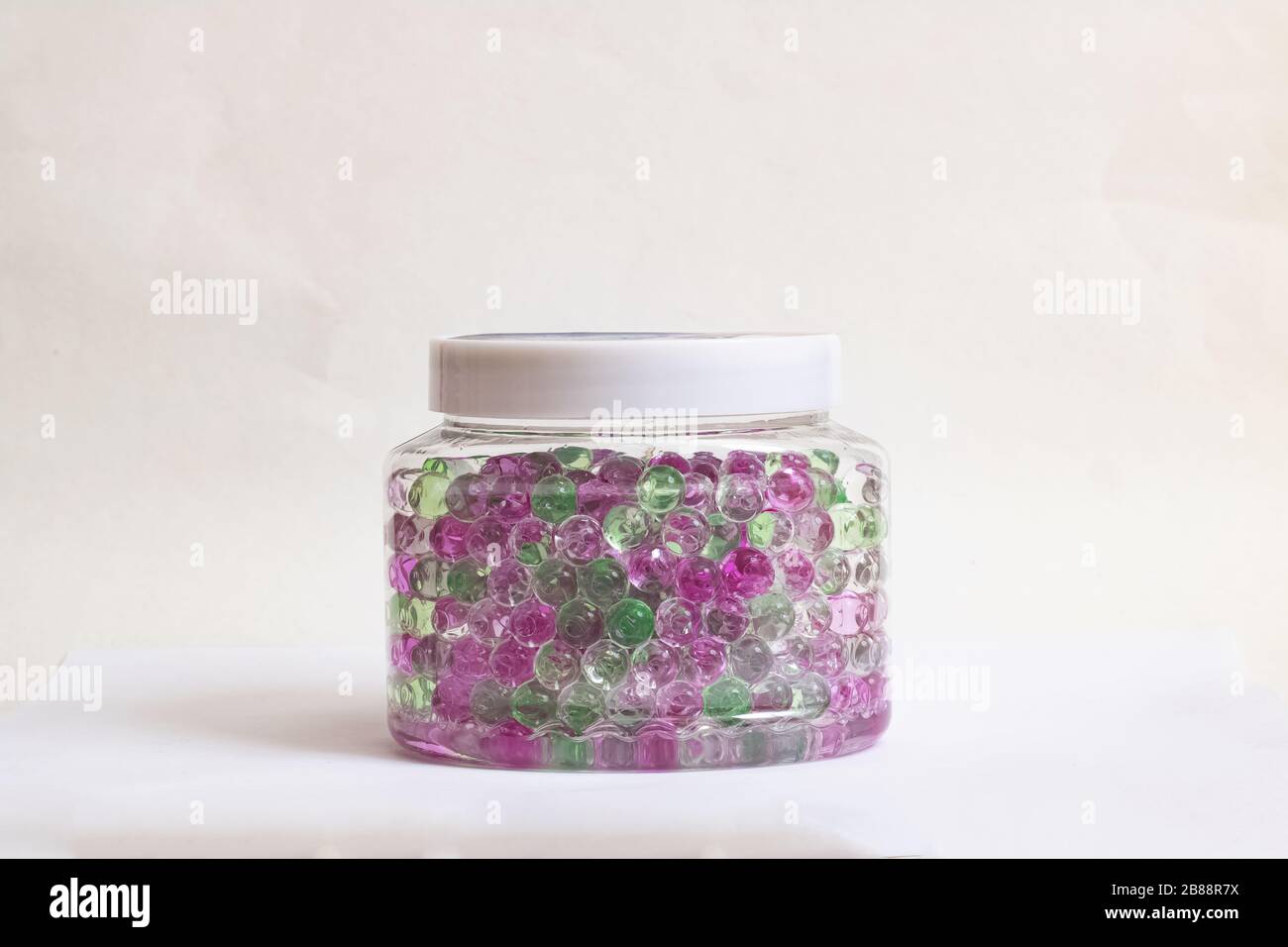 Jar with colored balls of air freshener Stock Photo