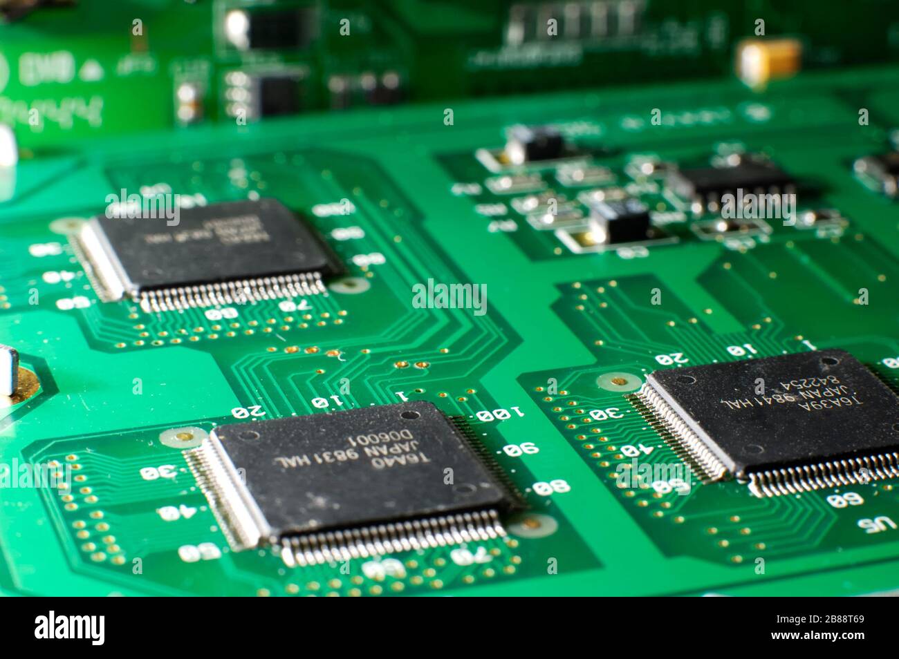 Close up green memory board with SMD chip lies on the table. Computer parts  concept. Electronic Parts and Component Stock Photo - Alamy