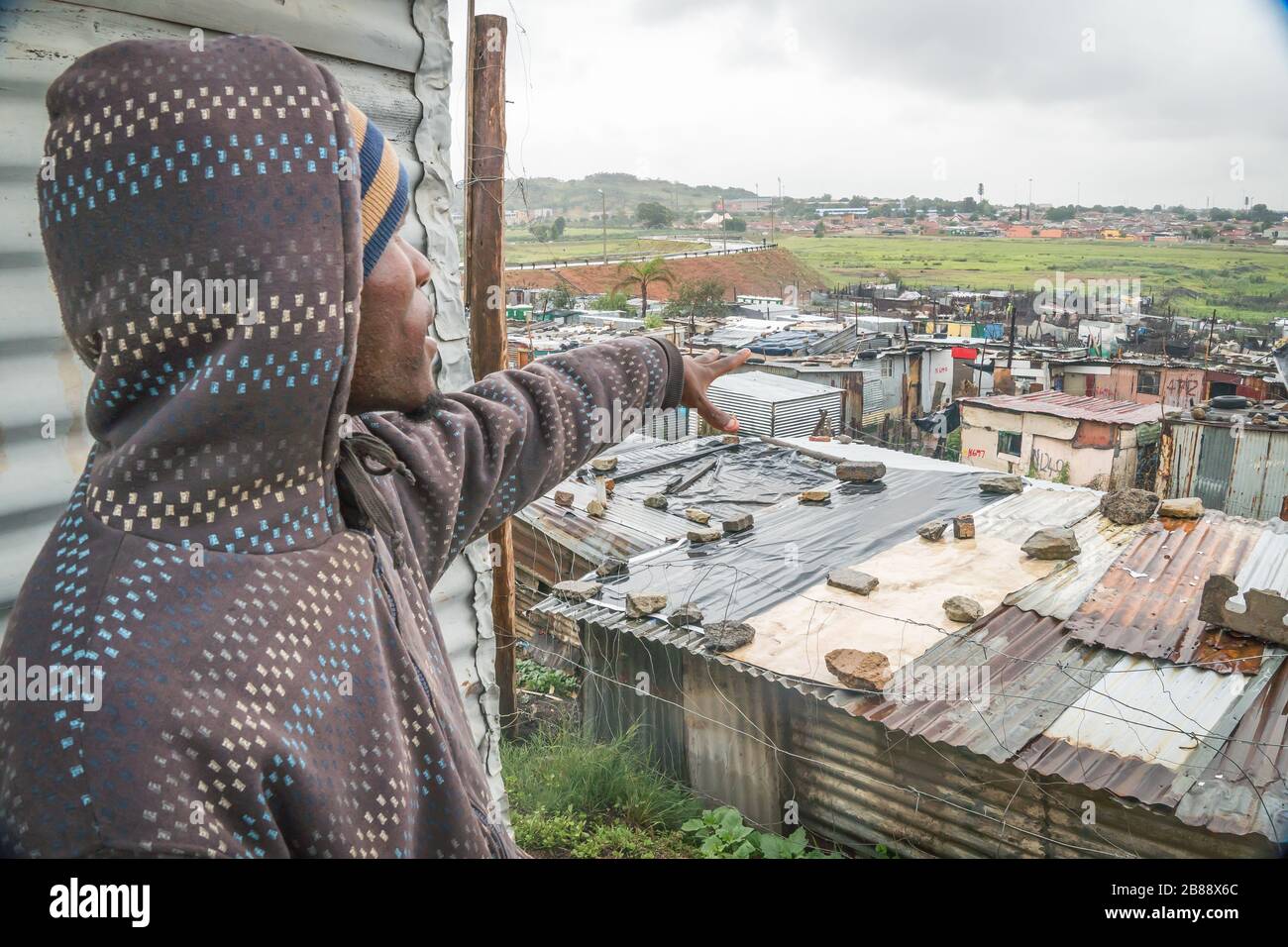 Soweto, Johannesburg, South Africa - December 5, 2019 - Shacks have no water, residents use communal toilets and connect to electricity illegally Stock Photo