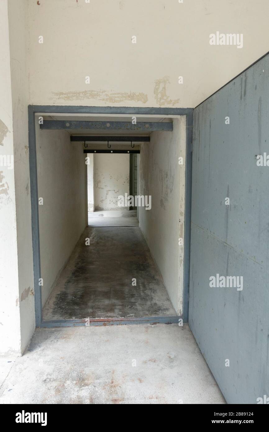 Looking into a disinfection chamber attached to the crematorium in the former Nazi German Dachau concentration camp, Munich, Germany. Stock Photo