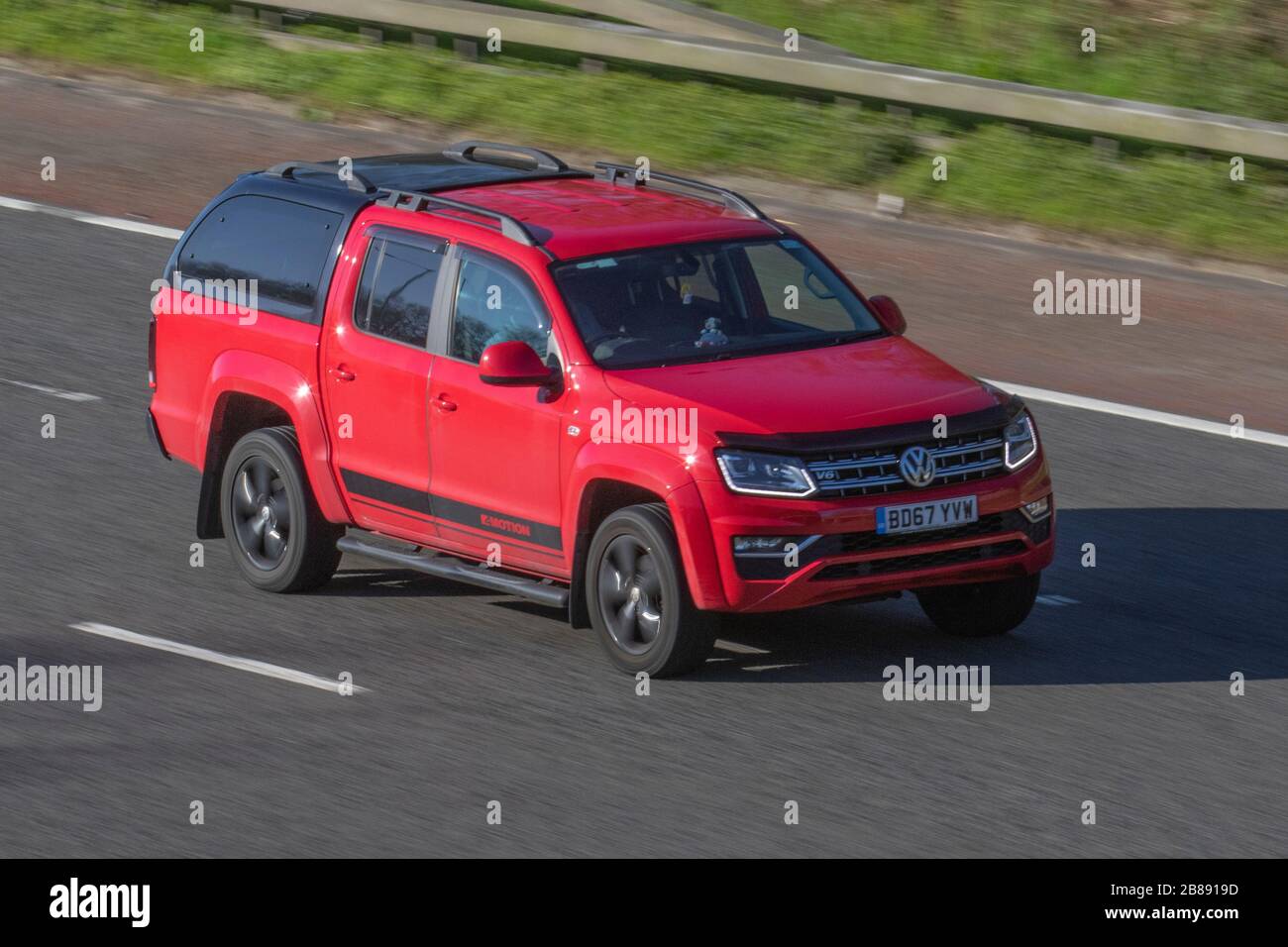 2017 red VW Volkswagen Amarok Highline V6 TDI 4M; UK vehicular traffic,  transport, moving vehicles, vehicle, roads, motors, motoring on the M6  motorway highway Stock Photo - Alamy