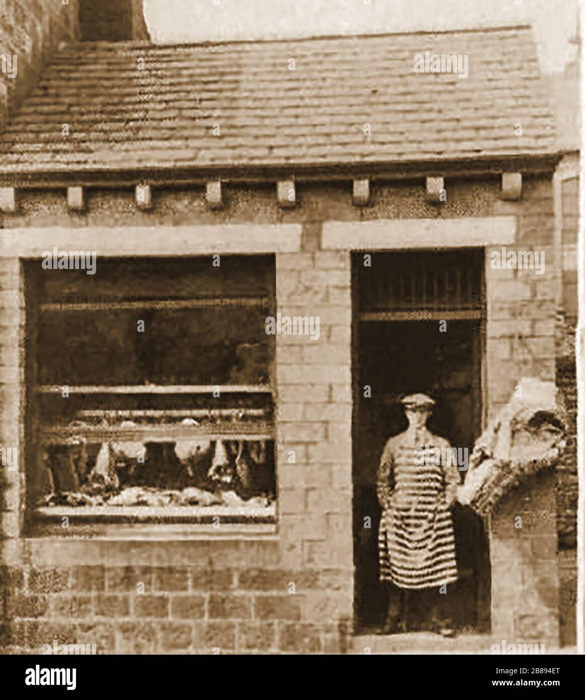Huddersfield Industrial Society An  historic photograph of Almondbury butchers shop Stock Photo