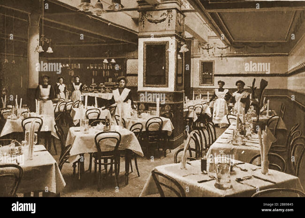 Huddersfield Industrial Society - An early photograph of the society's restaurant  in Buxton Road with waitress staff. Stock Photo