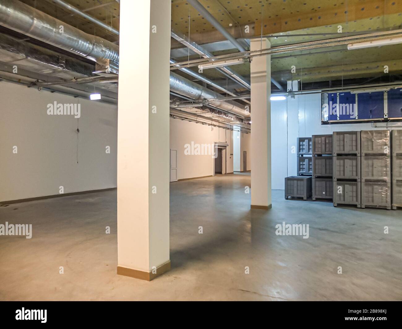 Pipelines for air conditioning and ventilation systems under the roof of a modern warehouse Stock Photo