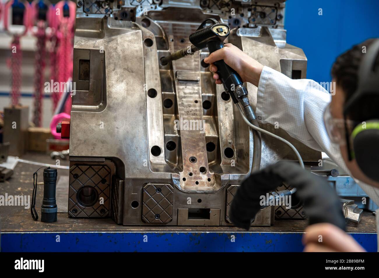 the engineer performs freezing of the casting using a special machine