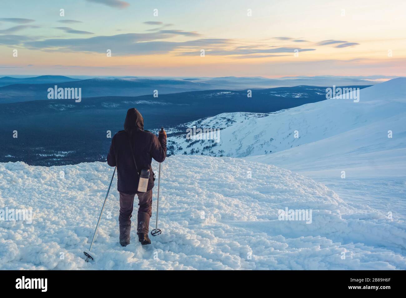 Tourist in the wild. Snow storm, despair. Lost his way. Ural winter la Stock Photo