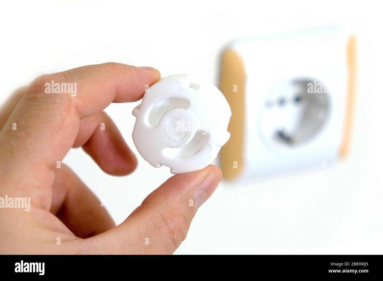 child protection apparatus for electrical outlets Stock Photo Alamy