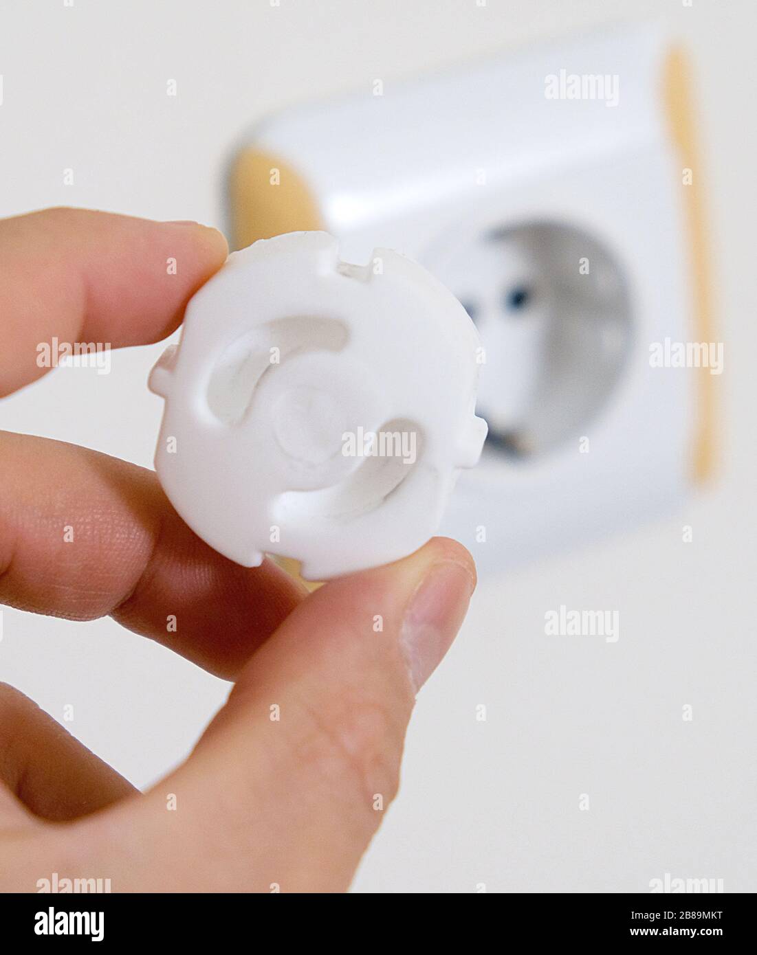 child protection apparatus for electrical outlets Stock Photo Alamy