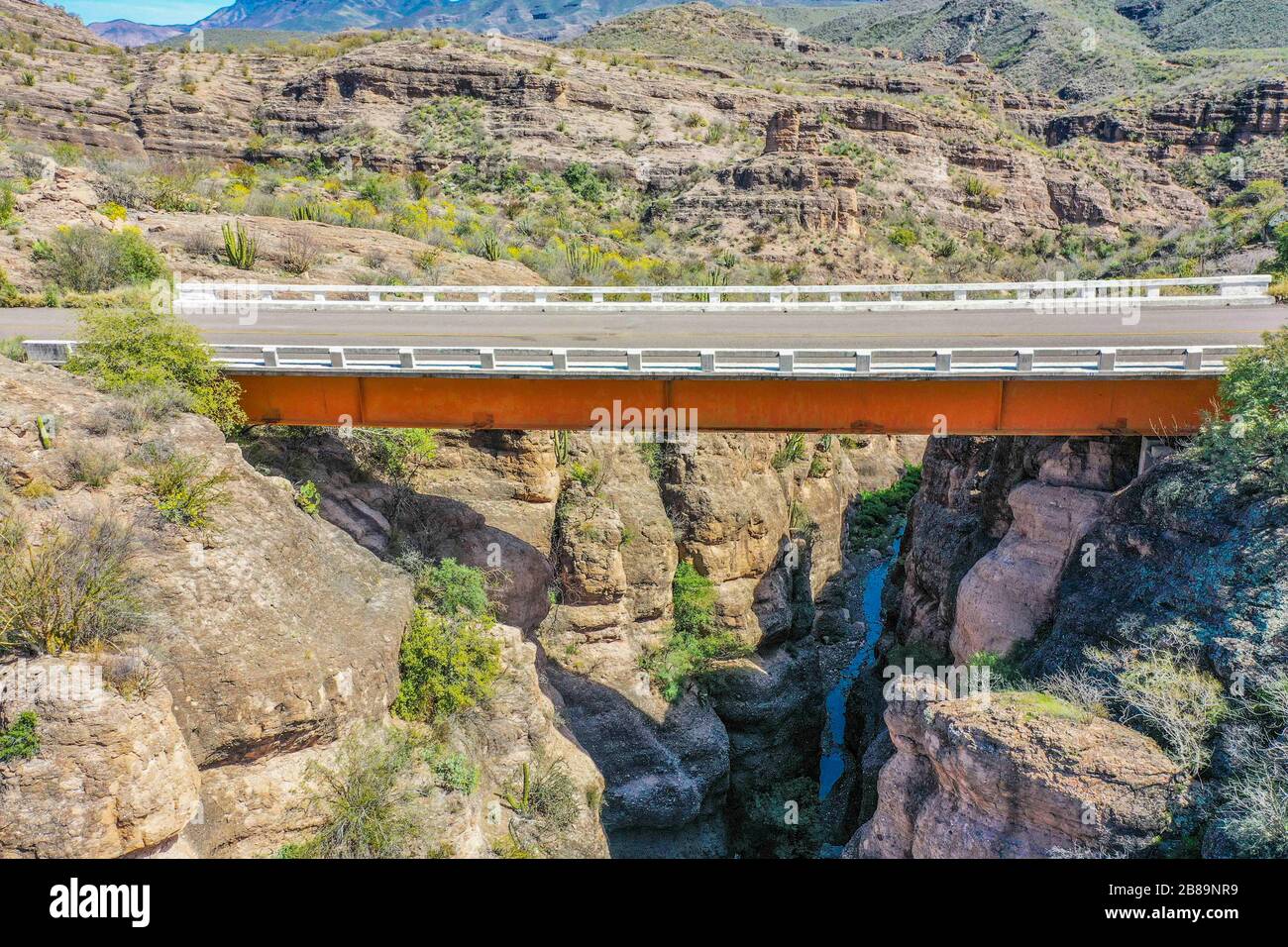 Aerial view of bridge road and canyon landscape between the