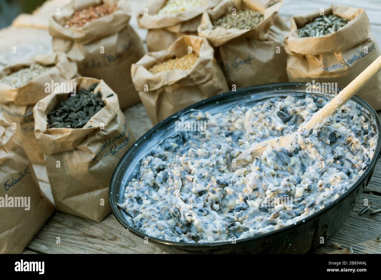 Homemade fat fodder hardened coconut oil was melted and seed mix added