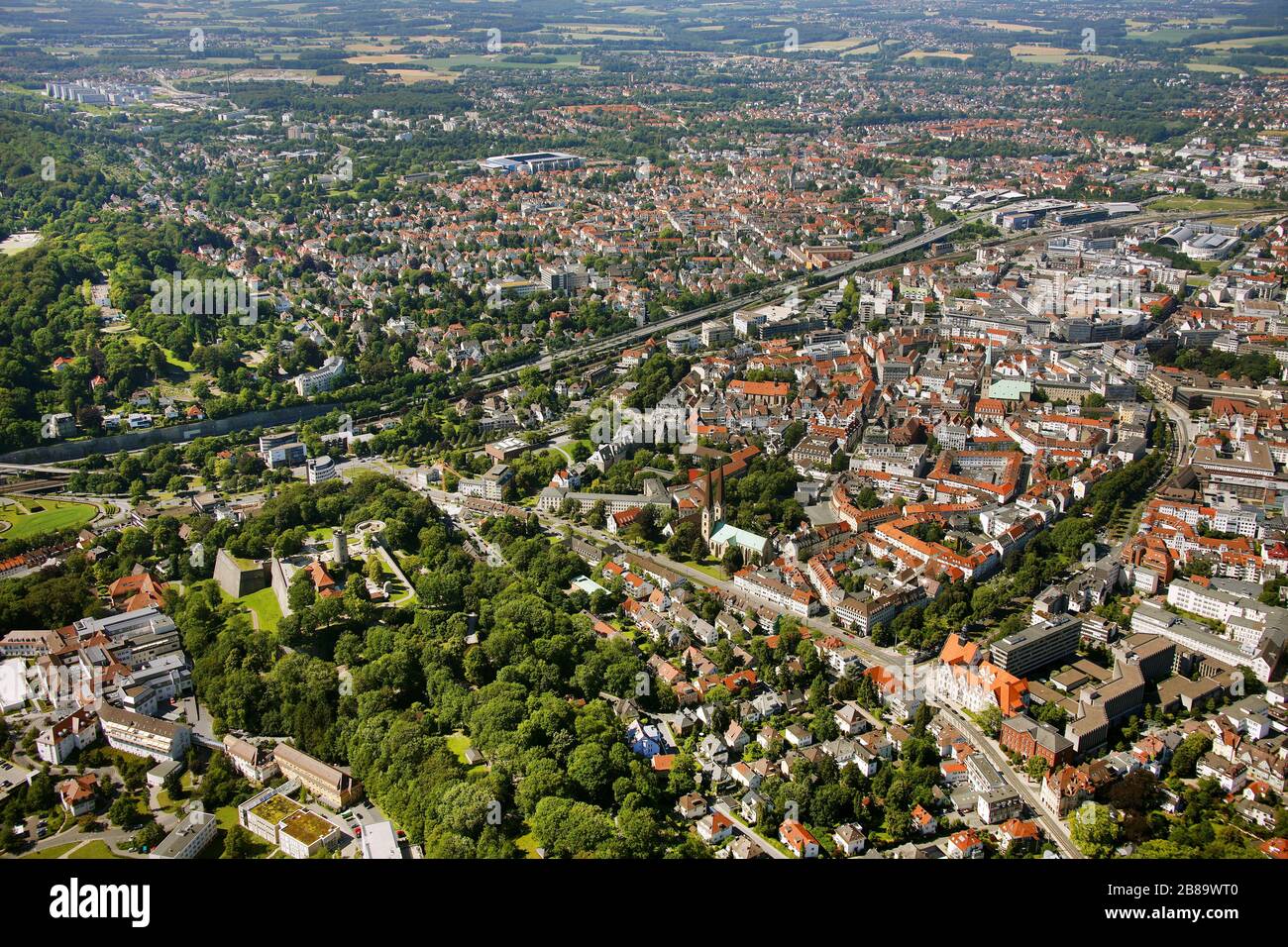 , historic centre of Bielefeld with castle Sparrenburg, in the background the football stadium Bielefelder Alm, 27.06.2011, aerial view, Germany, North Rhine-Westphalia, East Westphalia, Bielefeld Stock Photo